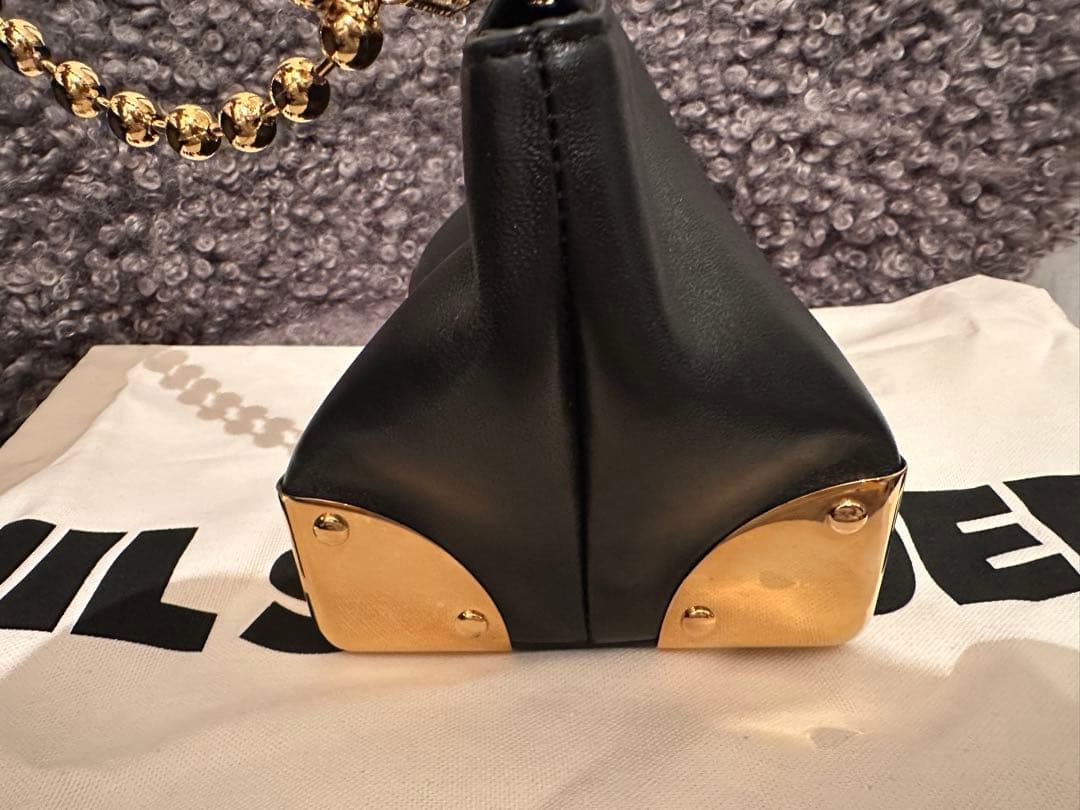 Sacai コーナーメタルクラッチ