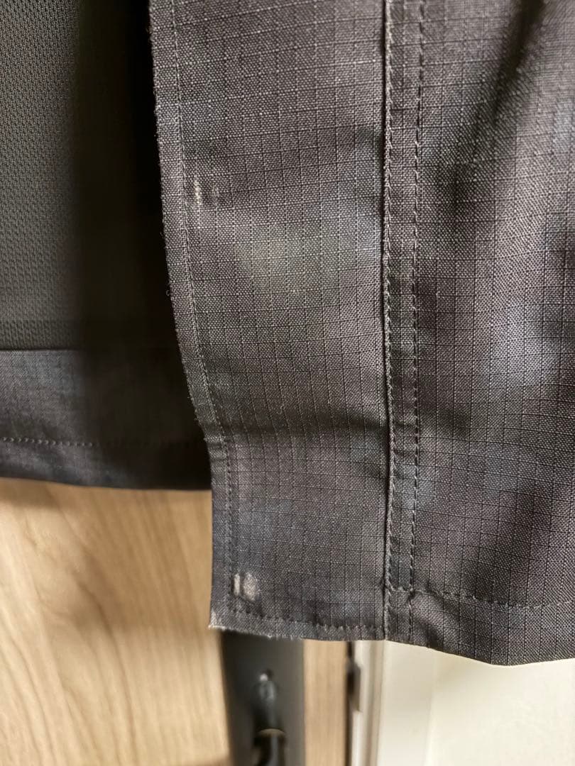 クシタニ フィンジャケット ブラックカモフラ/L