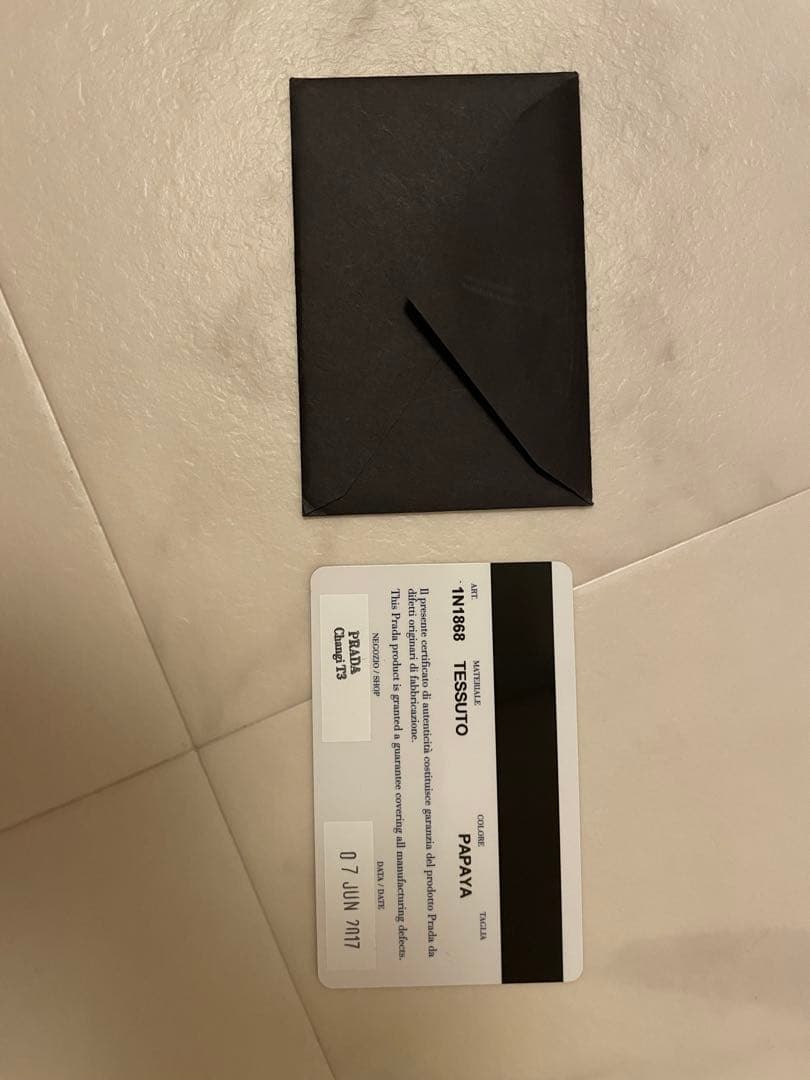 PRADA オレンジ クラッチバッグ