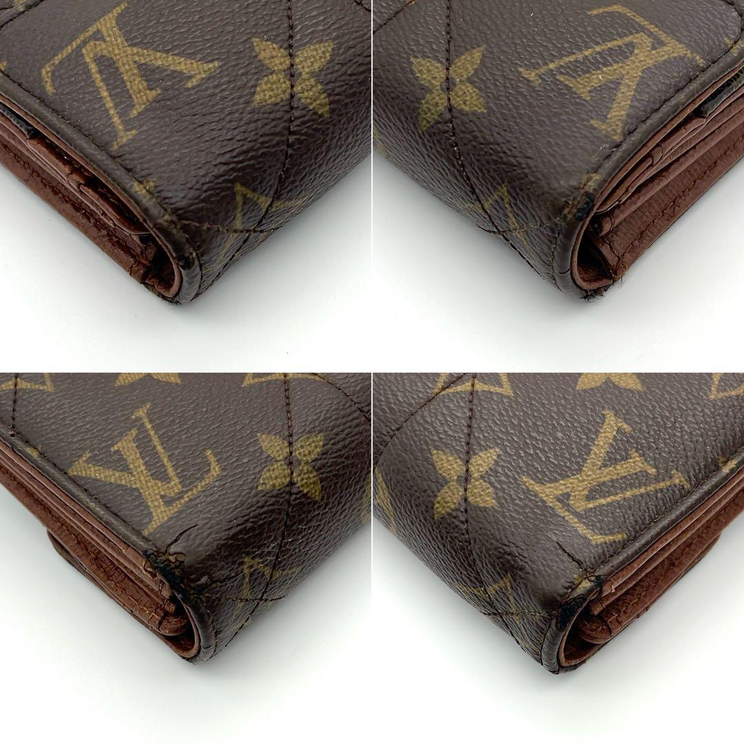 ルイヴィトン 長財布 モノグラム サラ エトワール ターンロック