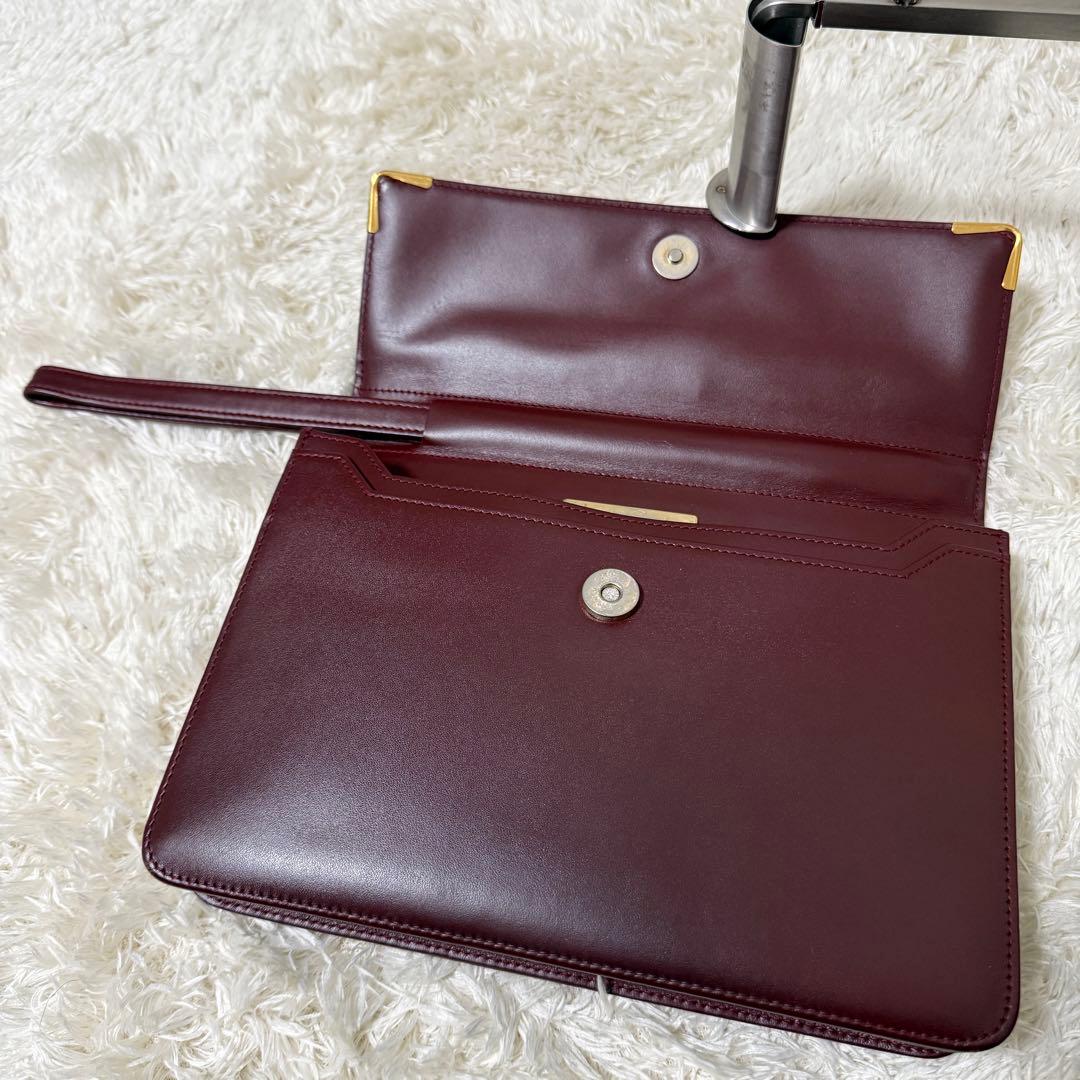 カルティエ　マストライン　クラッチバッグ　ボルドー　ロゴ金具