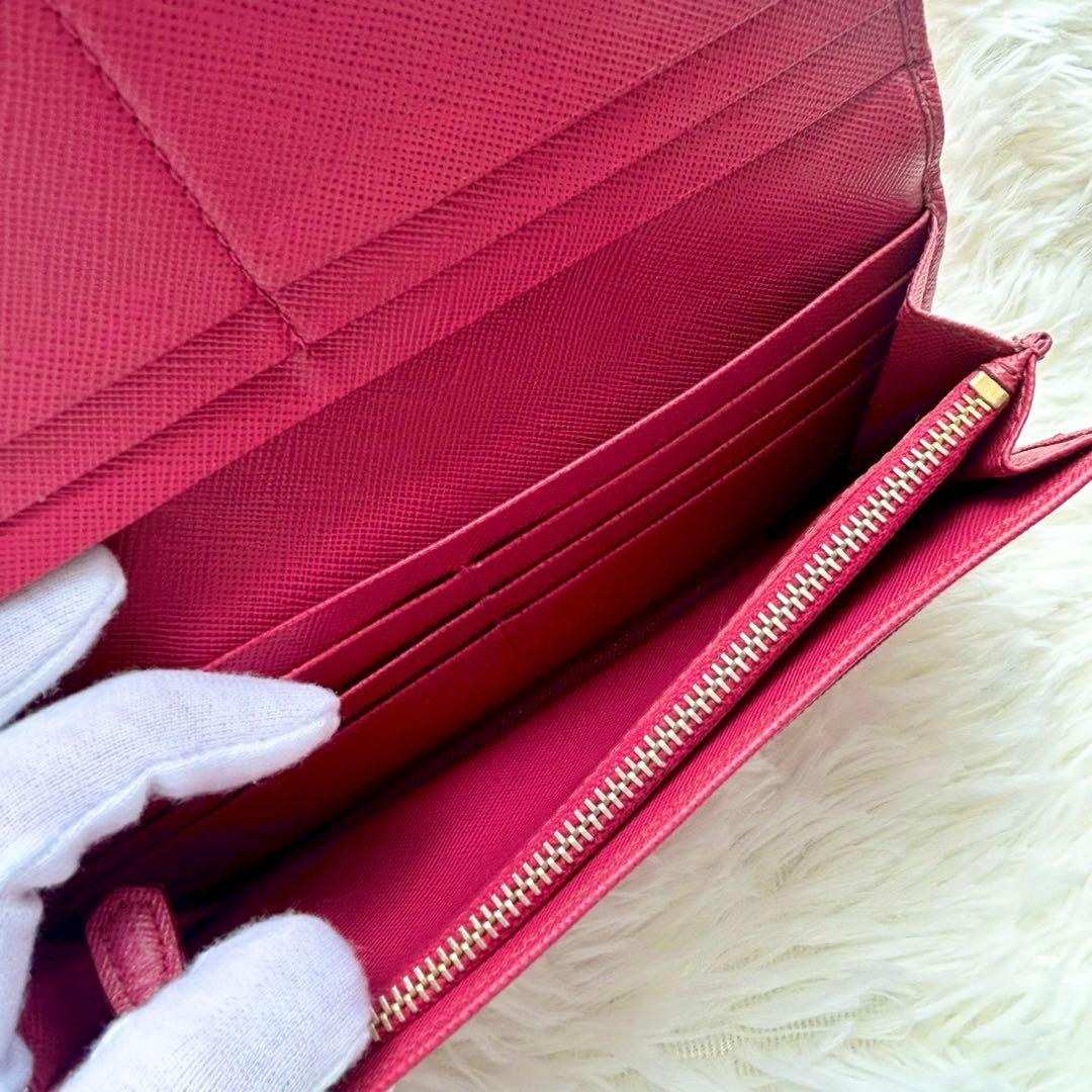 美品✨プラダ 長財布 サフィアーノ フィオッコ ピンク メタルロゴ リボン