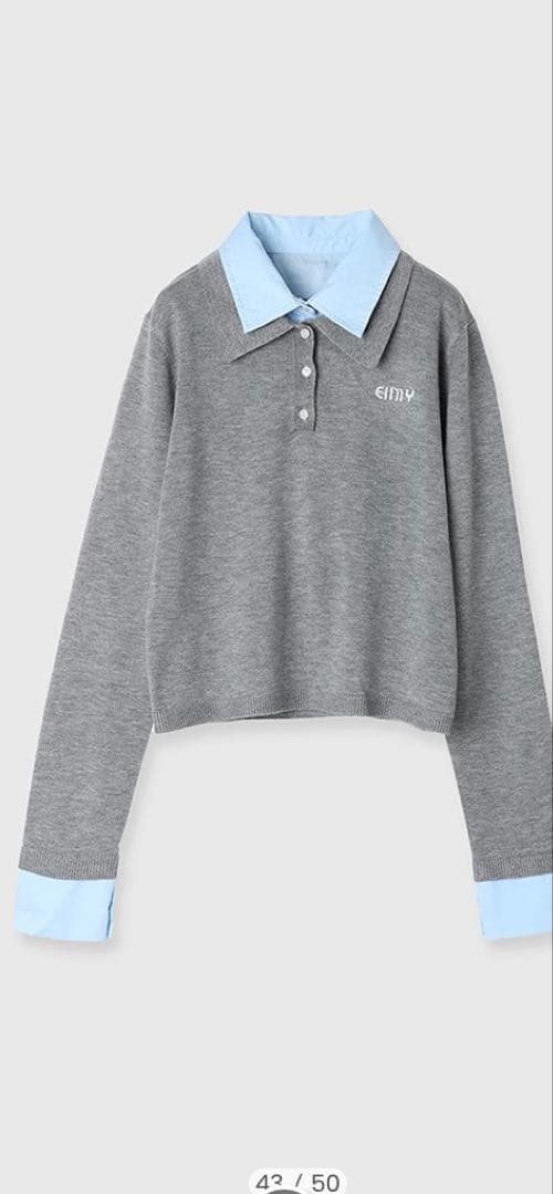 グレーの長袖ポロシャツ