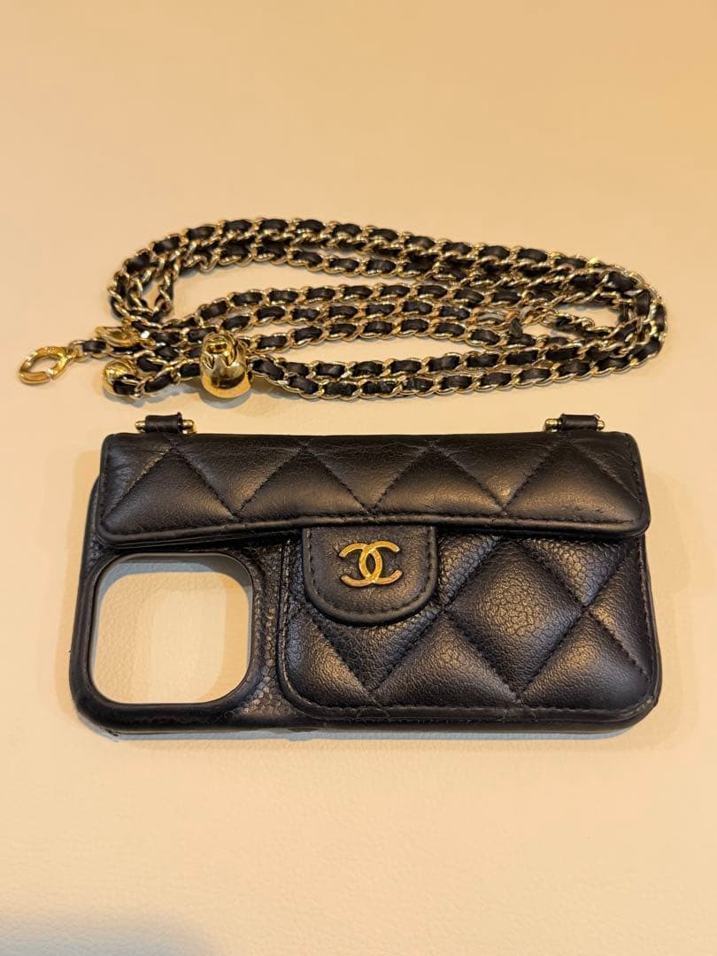 CHANEL iPhone14Proスマホケースキャビアスキンマトラッセチェーン