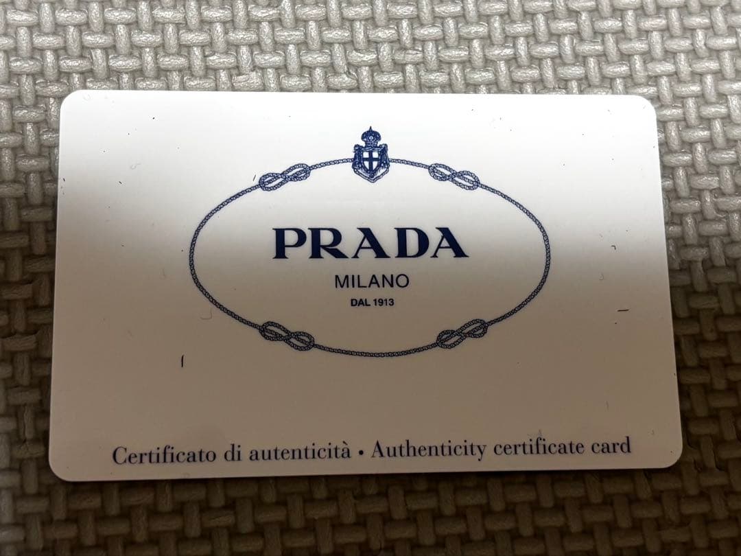 え*ん様 【新年特価】PRADA プラダ 水色 レザー 長財布 ショッパー付き