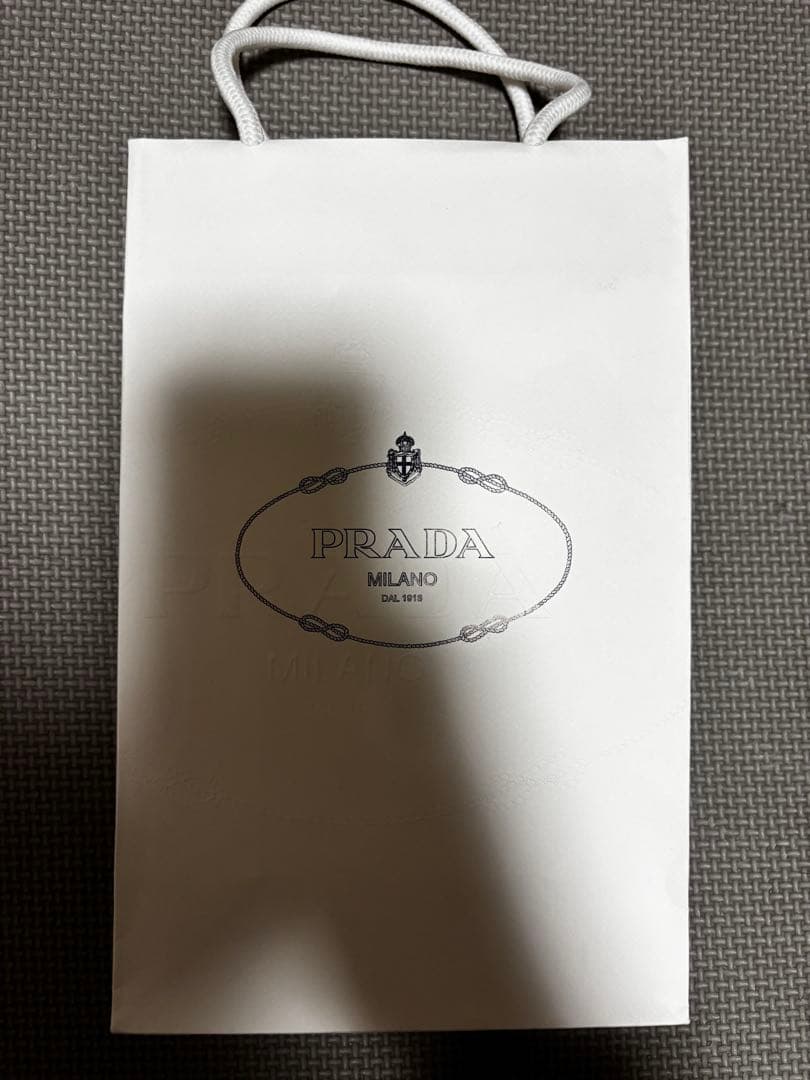 え*ん様 【新年特価】PRADA プラダ 水色 レザー 長財布 ショッパー付き