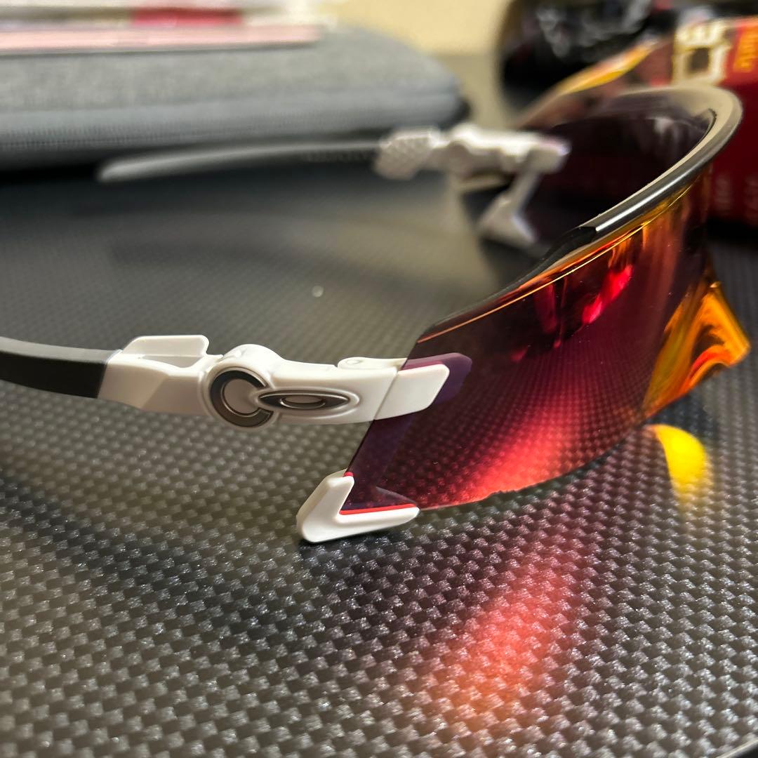 Oakley スポーツサングラス 赤色レンズ