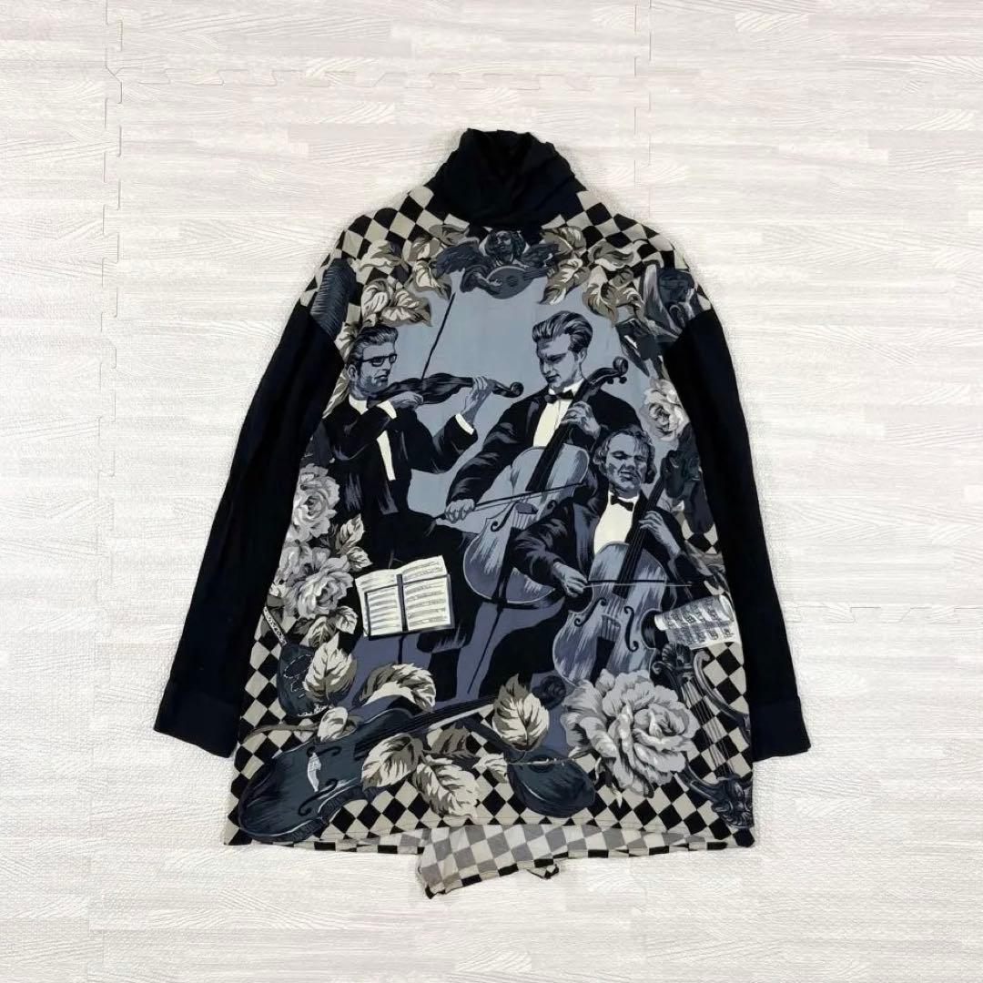 トクコプルミエヴォル✨デザインチュニック　ブラウス　総柄　音楽家　変形　9号