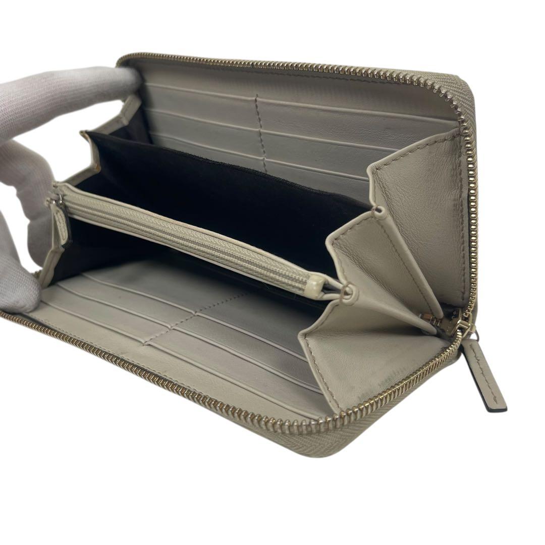 グッチ　長財布　GGシマレザー　ロゴプレート　ロゴ総柄　型押　ラウンドファスナー