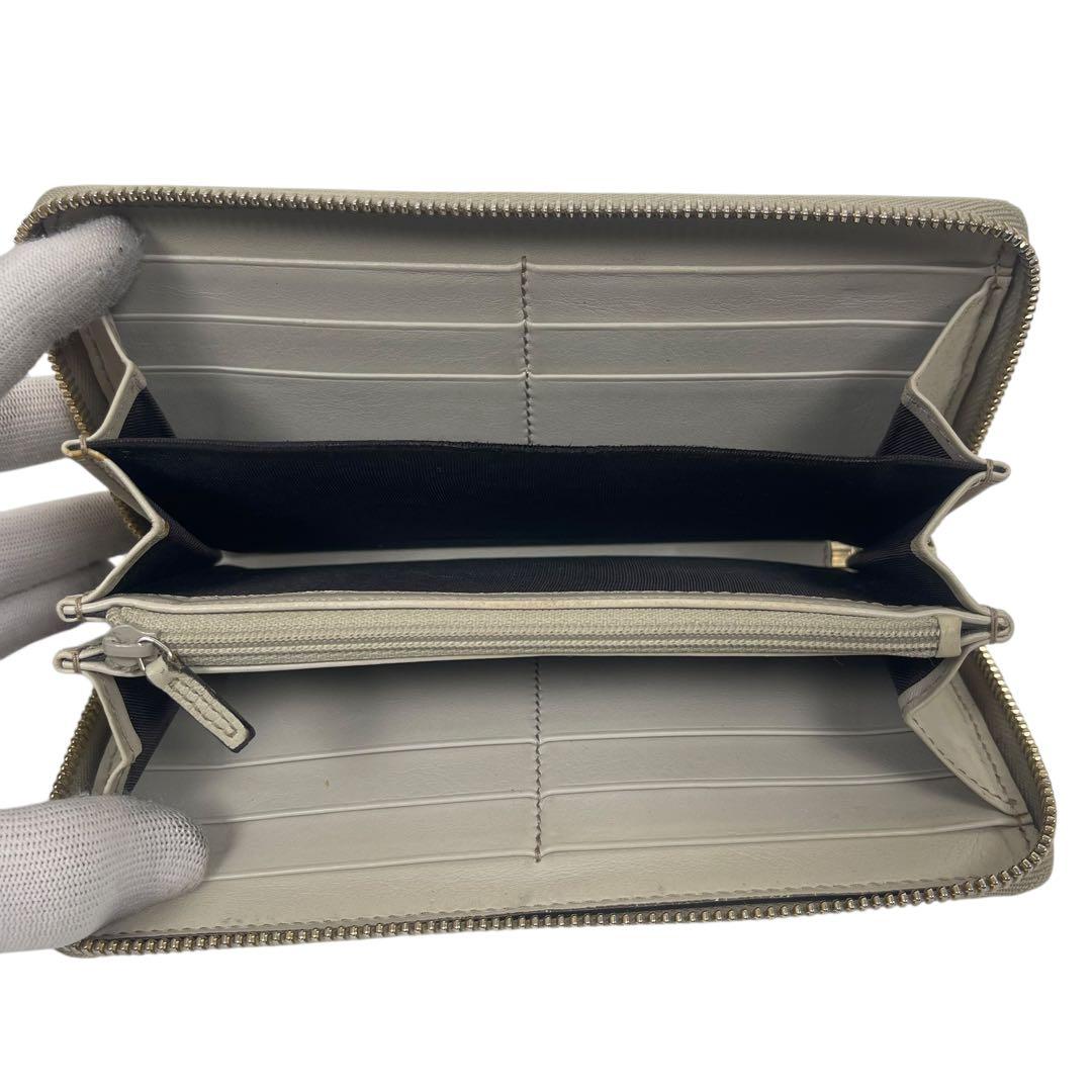 グッチ　長財布　GGシマレザー　ロゴプレート　ロゴ総柄　型押　ラウンドファスナー