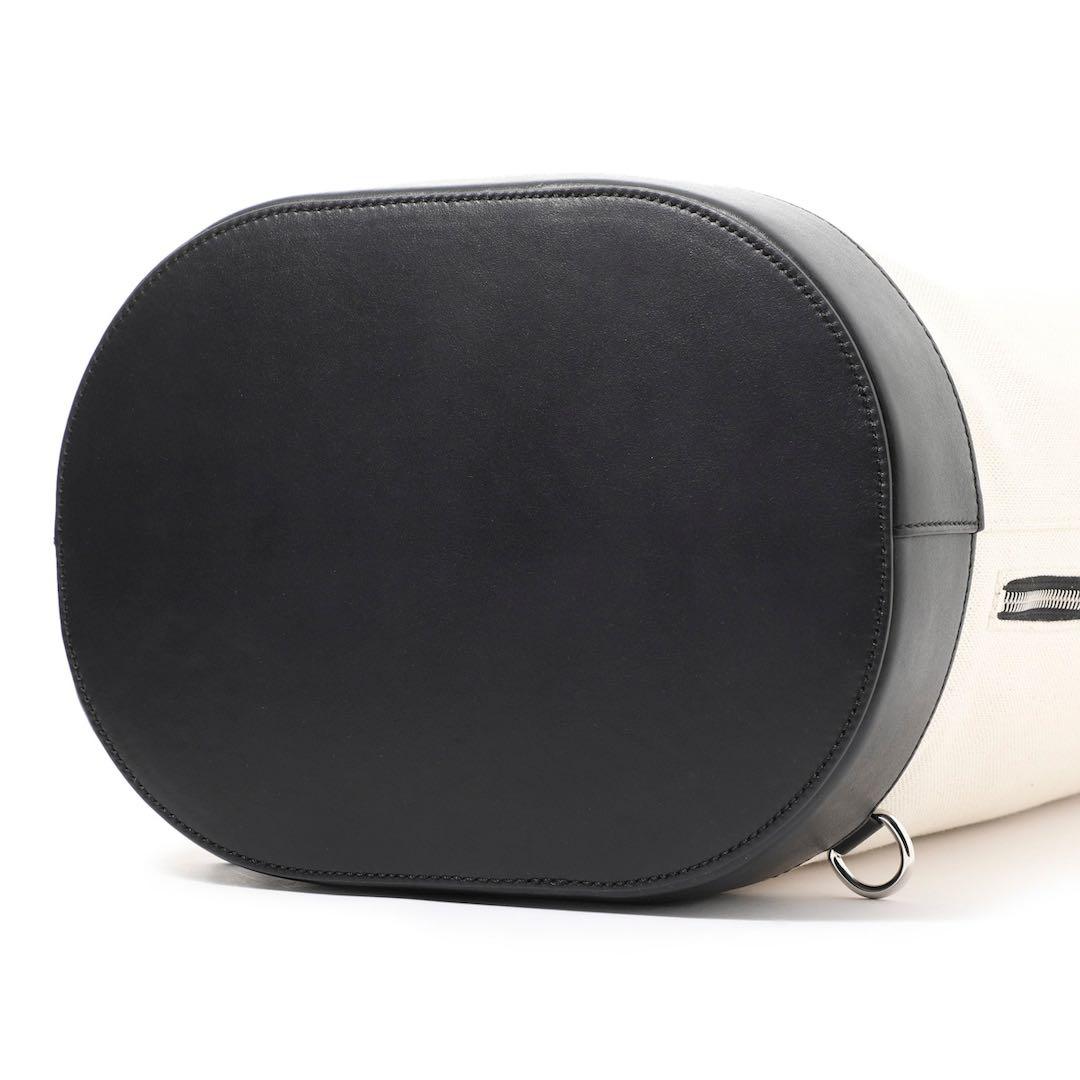 JIMMY CHOO EVANドラムバッグ ホワイト/ブラック