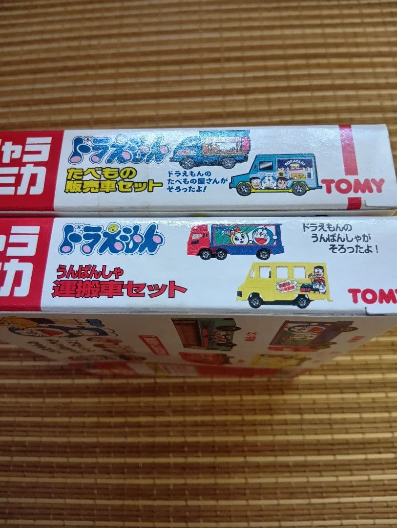 【新品未開封】キャラトミカ　ドラえもん　たべもの販売車セット&運搬車セット
