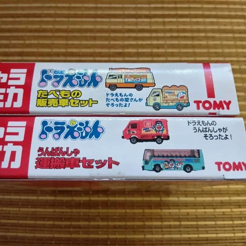 【新品未開封】キャラトミカ　ドラえもん　たべもの販売車セット&運搬車セット
