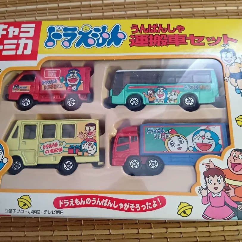 【新品未開封】キャラトミカ　ドラえもん　たべもの販売車セット&運搬車セット