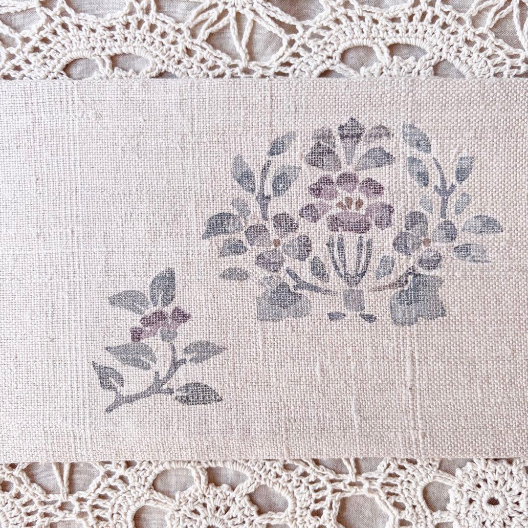 花と鳥の模様 くすんだピンクグレー ピンクベージュ 名古屋帯 紬帯