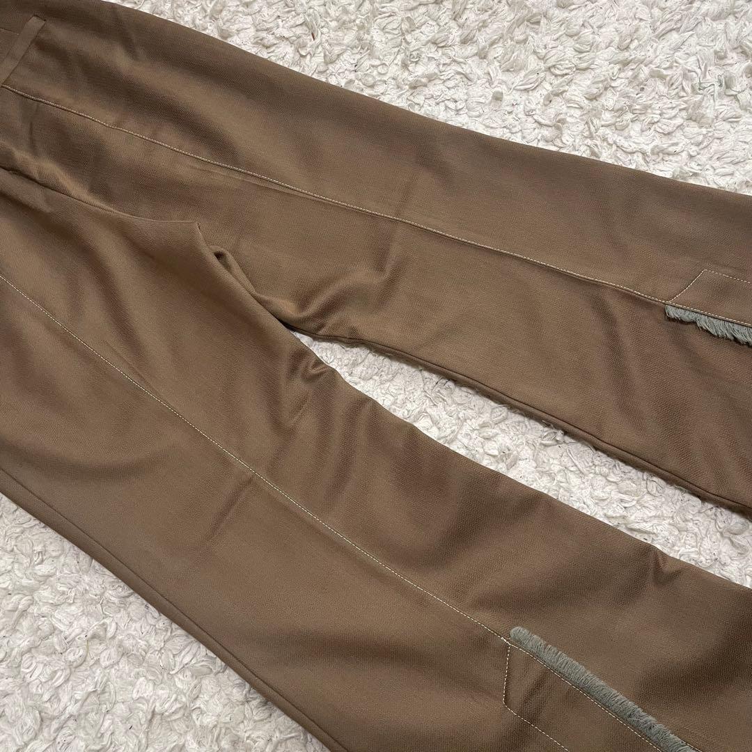 マメクロゴウチ ハイウエストバックフリンジフレアパンツ