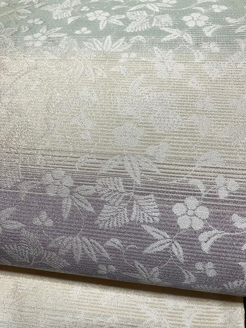 ツーシーズンリバーシブル袋帯 全通柄 正絹 正倉院百彩文 未使用に近いイ6524